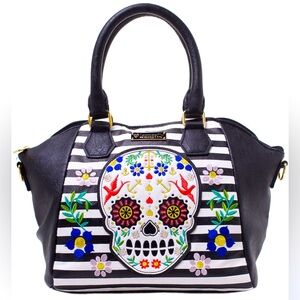 Loungefly Retired striped skull  Crossbody purse in excellent condition